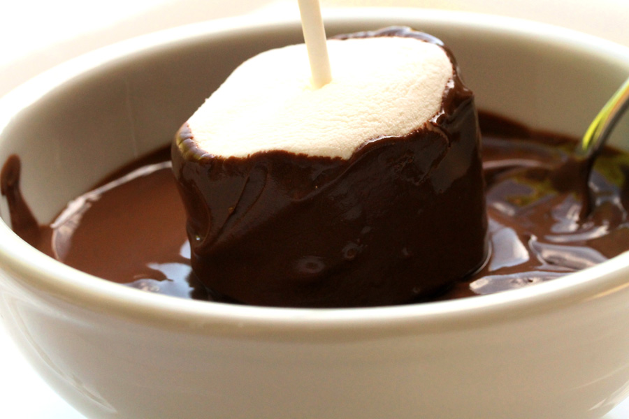 Then dip the top side of the marshmallow in the candy coating.